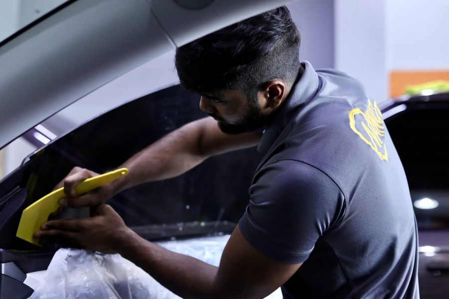 Nanoz technician fitting nano-ceramic window tint